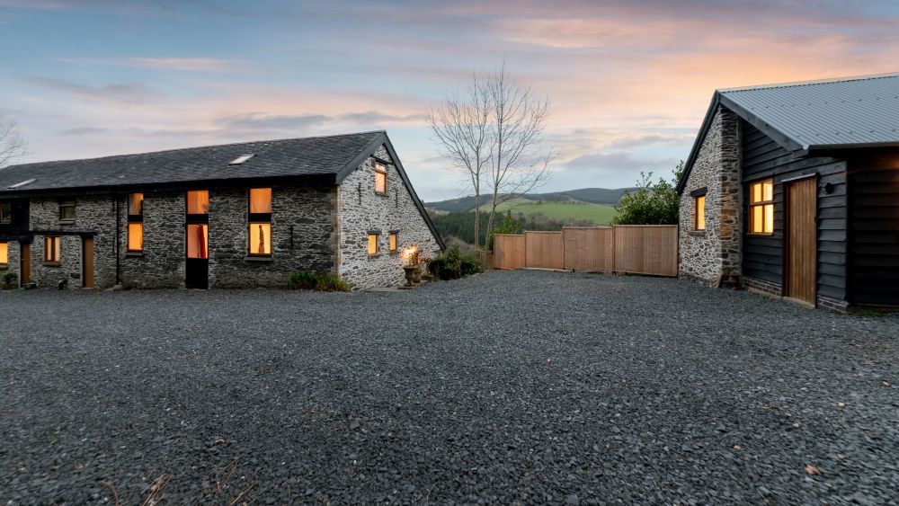 Cae Madog Barn luxury accommodation for 17 in the Cambrian Mountains with pool and hot tub