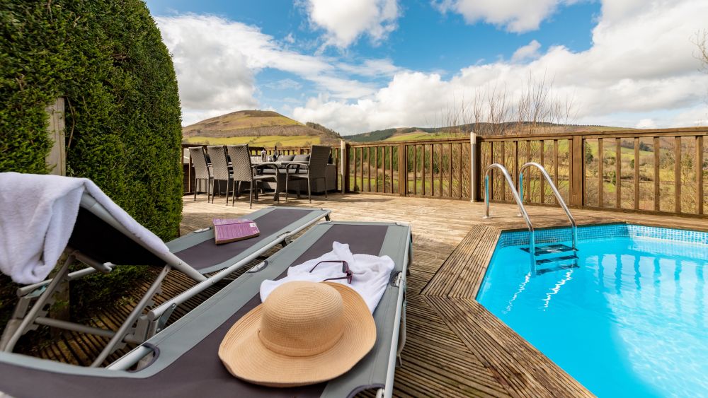 Cae Madog Barn luxury accommodation for 17 in the Cambrian Mountains with pool and hot tub