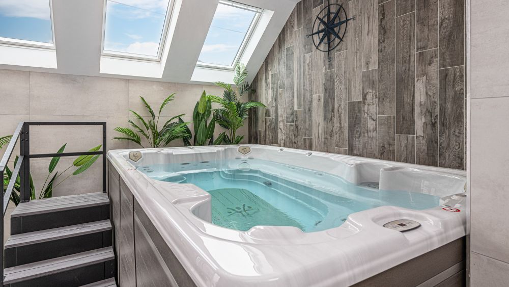 Ty Glas Beach House sleeps 22 across 11 en-suite bedrooms in Anglesey, North Wales