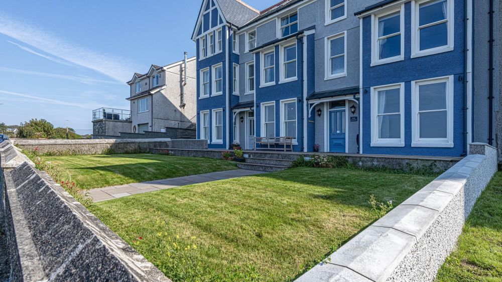 Ty Glas Beach House sleeps 22 across 11 en-suite bedrooms in Anglesey, North Wales